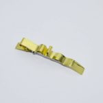 Pinza para pelo latón
